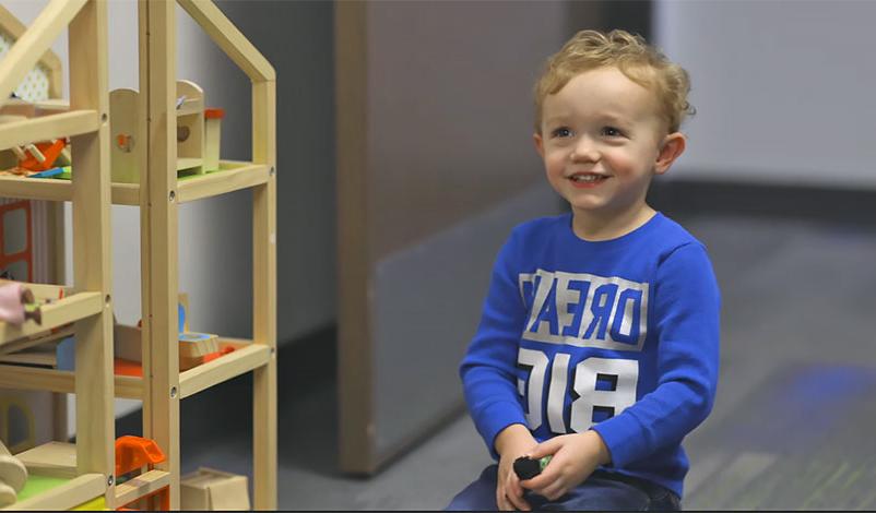 A child receiving play therapy at the Olson Marriage and Family Therapy Clinic